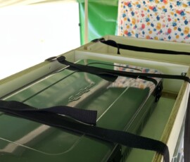 Kocher in Ablage mit Transportsicherung